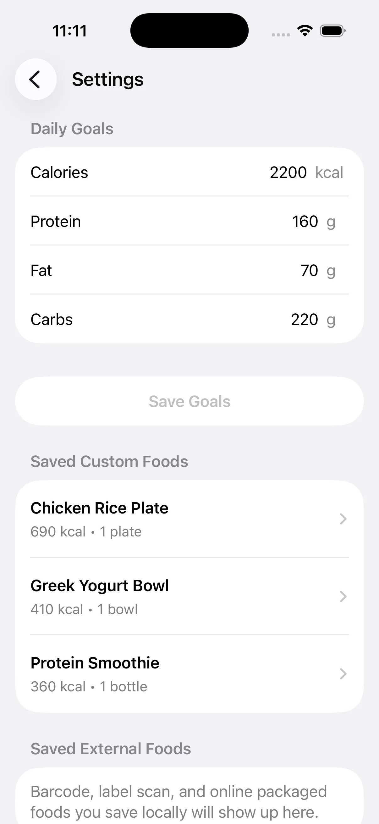 MACROS settings screen with goals and saved custom foods